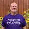 Robb McKay with t-shirt that reads "Read the Syllabus"